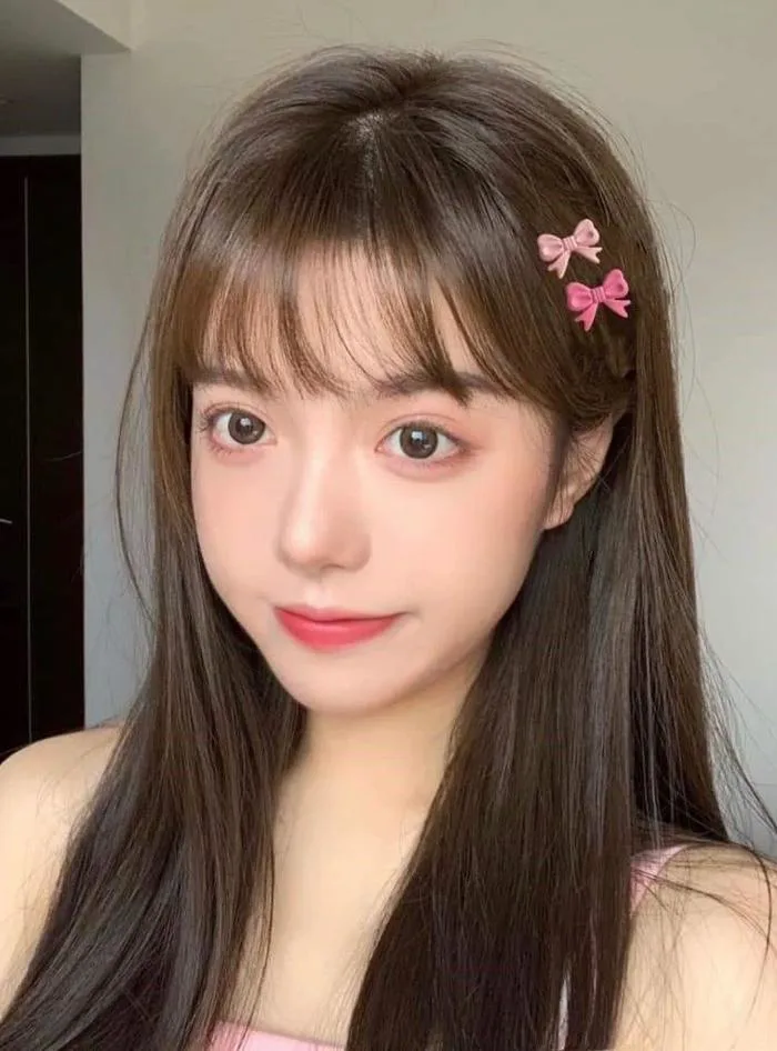 Kẹp tóc mái nơ hồng cute (set 2 cái)