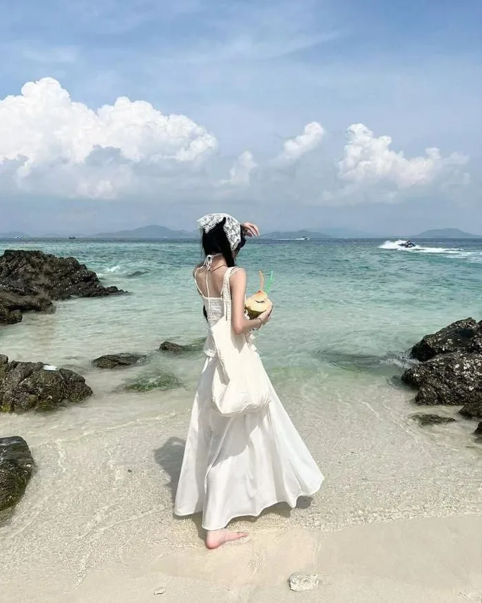 100+ Mẫu ảnh đi biển chụp sau lưng sáng tạo cho nàng tham khảo