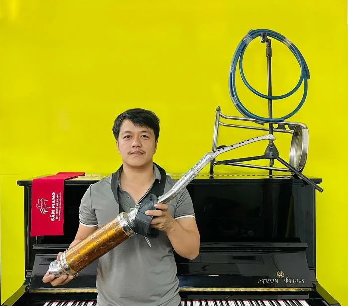 Chàng trai biến phế liệu thành nhạc cụ - Báo VnExpress Đời sống